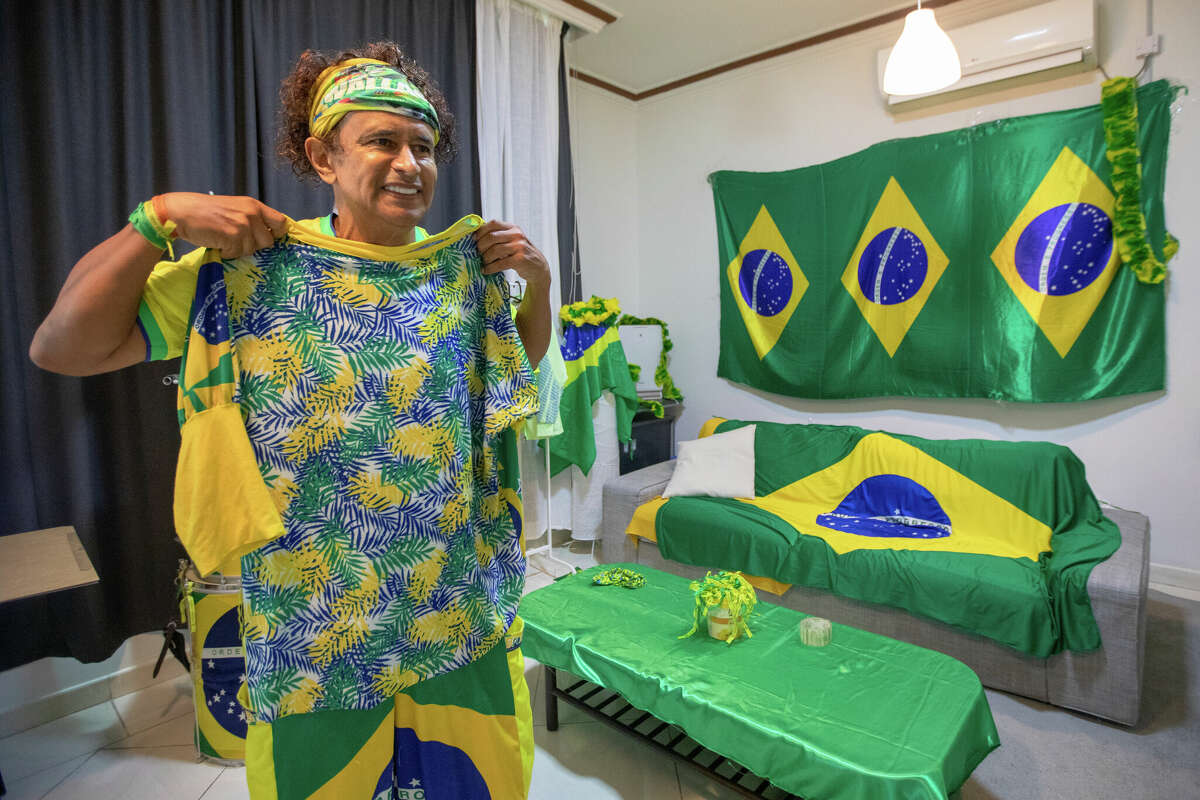 Brazilian Wallace Leite gets ready before Brazil and Switzerland World Cup game at his apartment in Doha, Qatar on November 28, 2022.