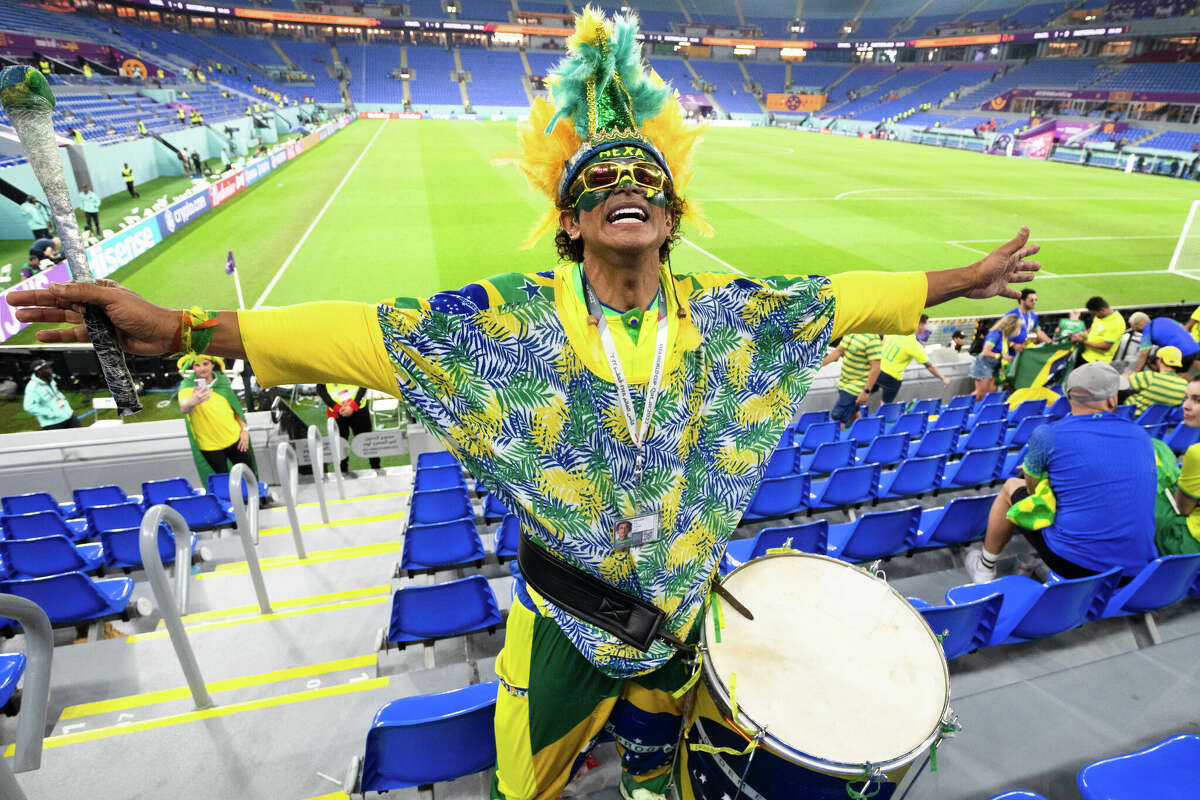 Brazilian Wallace Leite plays his drum in the stands after the Brazil and Switzerland World Cup game at Stadium 974 in Doha, Qatar on November 28, 2022.