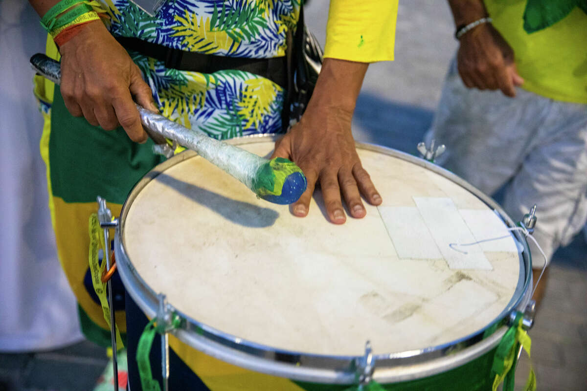 Brazilian Wallace Leite plays his drum outside Stadium 974 before the Brazil and Switzerland World Cup game in Doha, Qatar on November 28, 2022.
