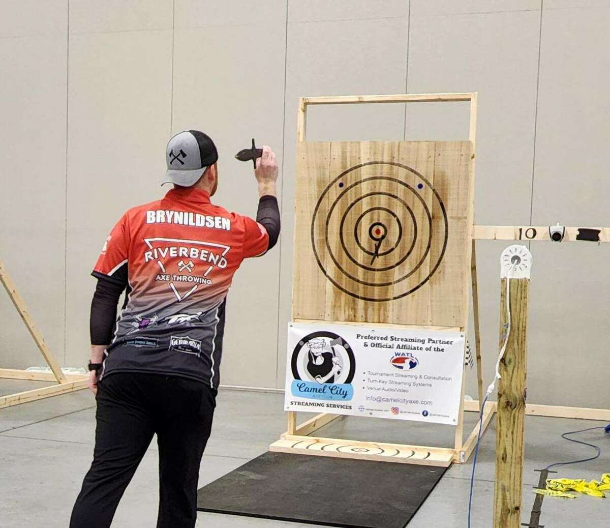 Daniel Brynildsen, 35, of Glen Carbon, prepares to throw a knife at the World Axe Throwing League's 6th annual World Axe Throwing Championship Dec. 1-4 in Appleton, Wisconsin. 