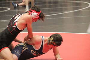 Sweet sweep for Coyotes: Reed City wrestlers start off 2-0