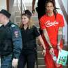 FILE - WNBA star and two-time Olympic gold medalist Brittney Griner is escorted to a courtroom for a hearing in Khimki just outside Moscow, on July 7, 2022. Russia has freed WNBA star Brittney Griner on Thursday in a dramatic high-level prisoner exchange, with the U.S. releasing notorious Russian arms dealer Viktor Bout.