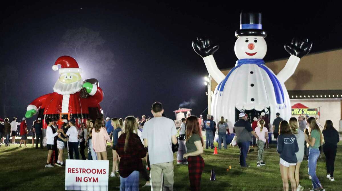 Visitors enjoy ride and during Fellowship of Montgomery Church’s Winter Wonderland event, Wednesday, Dec. 7, 2022, in Montgomery.