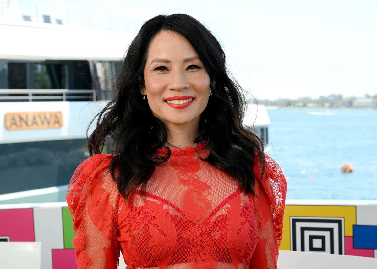 #50. Lucy Liu - Liked by: 60% - Disliked by: 4% - Neutral opinion: 22% - Have heard of: 86% Lucy Liu rose to stardom from her role as Alex Munday in "Charlie's Angels." She was the first Asian American woman to host NBC's long-running "Saturday Night Live" in 2000. Liu has recently tapped into other interests, such as directing and artmaking. She has exhibited at the National Museum of Singapore and held her first U.S. exhibition at the Napa Valley Museum.