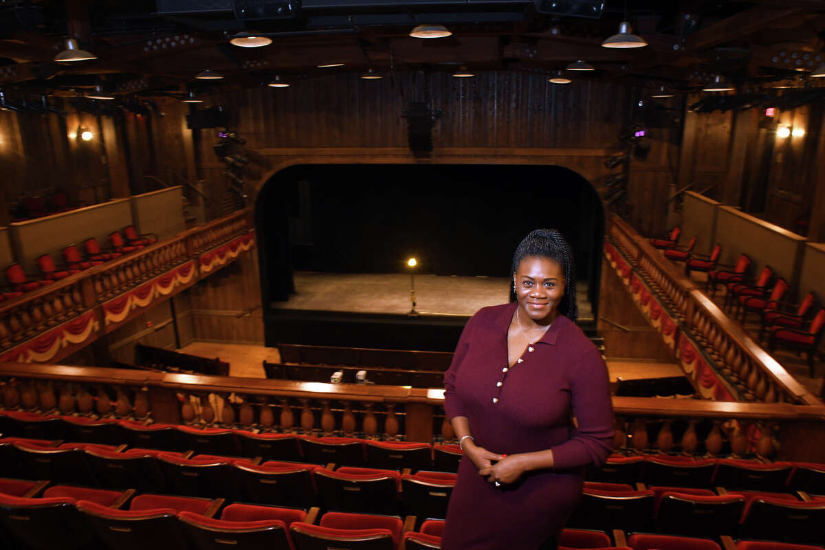 Erika Wesley poses in the balcony of the Westport Country Playhouse, in Westport, Conn. Dec. 7, 2022. Wesley in the new Director of Equity, Diversity and Inclusion at the Playhouse.