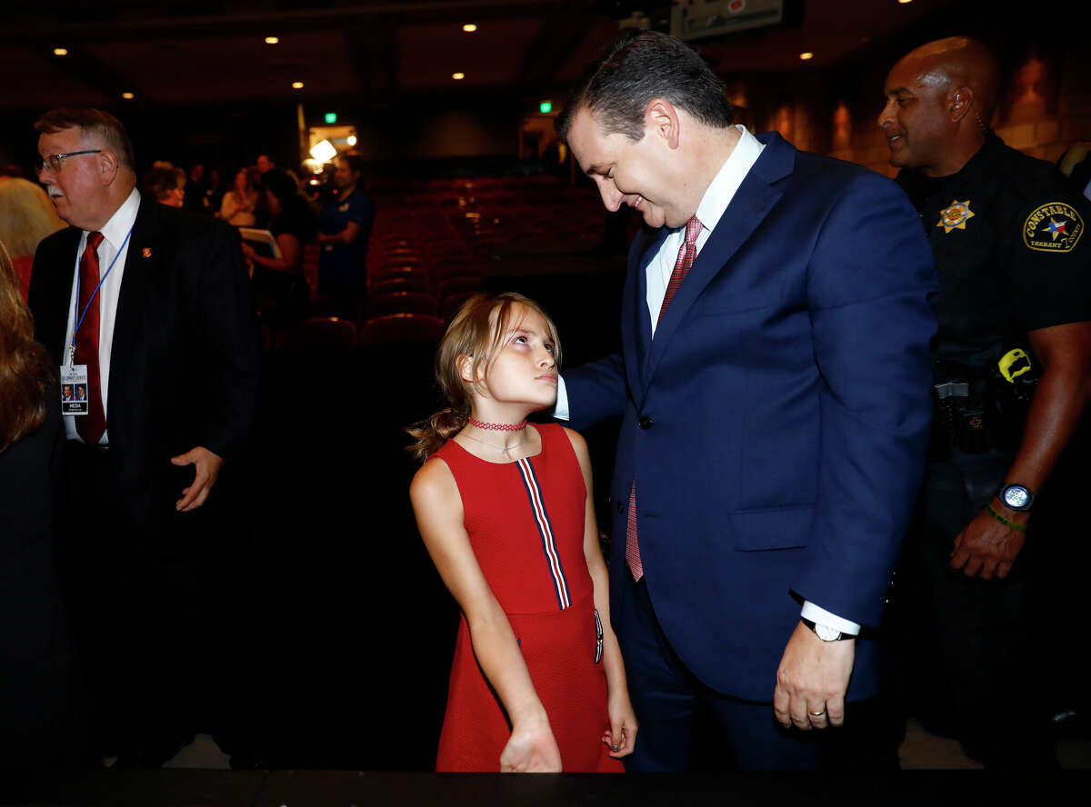 Sen. Ted Cruz (R-TX) talks with his daughter after a debate with Rep. Beto O'Rourke at McFarlin Auditorium at SMU on September 21, 2018 in Dallas, Texas. 