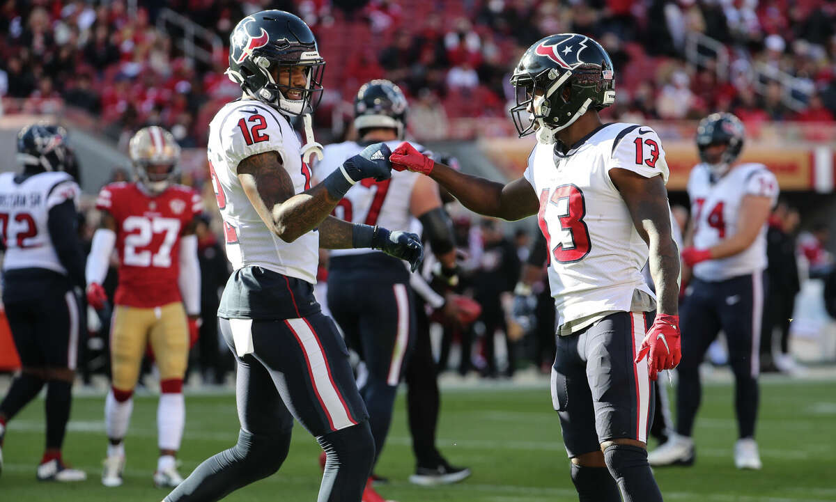 Houston Texans wide receiver Brandin Cooks (13) celebrates his 8-yard touchdown reception against the San Francisco 49ers with Nico Collins (12) during the second quarter of an NFL football game Sunday, Jan. 2, 2022, in Santa Clara, Calif.