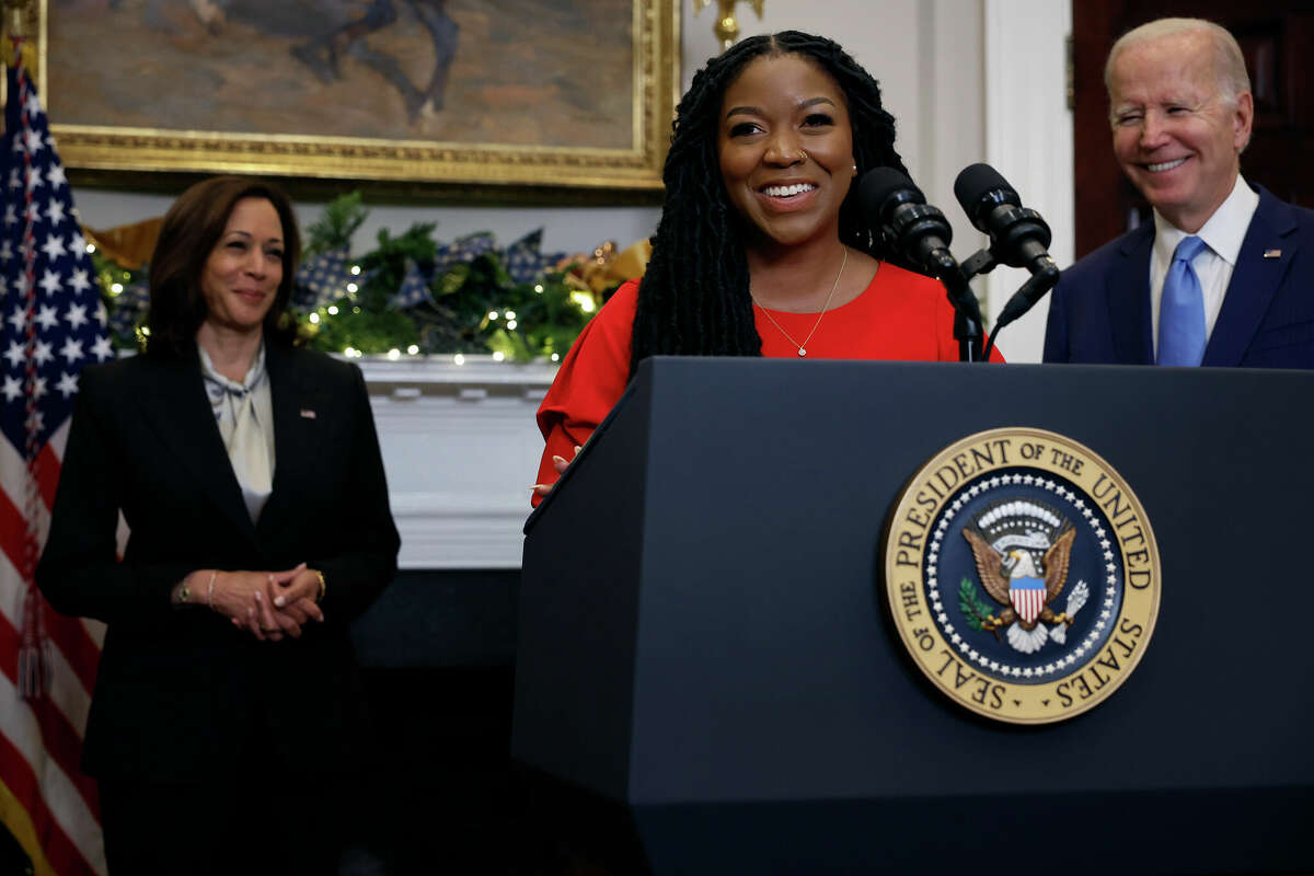 Cherelle Griner (C), wife of Olympian and WNBA player Brittney Griner, speaks after US President Joe Biden announced his release from Russian custody, with Vice President Kamala Harris in the Roosevelt Room of the White House on December 08, 2022.