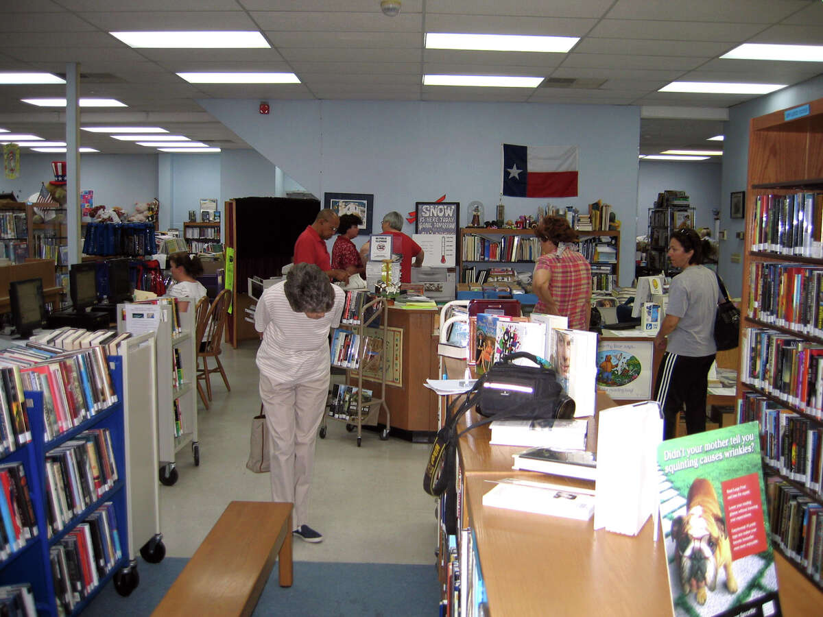 Patrons visit the Leon Valley Public Library in 2008. The city council now has the authority to review book and material that are challenged. 