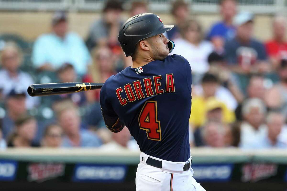 MINNEAPOLIS, MN - AUGUST 22: Carlos Correa #4 of the Minnesota Twins hits a triple against the Texas Rangers in the first inning at Target Field on August 22, 2022 in Minneapolis, Minnesota. (Photo by David Berding/Getty Images)