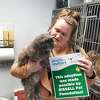 Rebecca Stothard is reunited with 15-year-old Coco at the Humane Society of Midland County shelter on Dec. 6, 2022. 