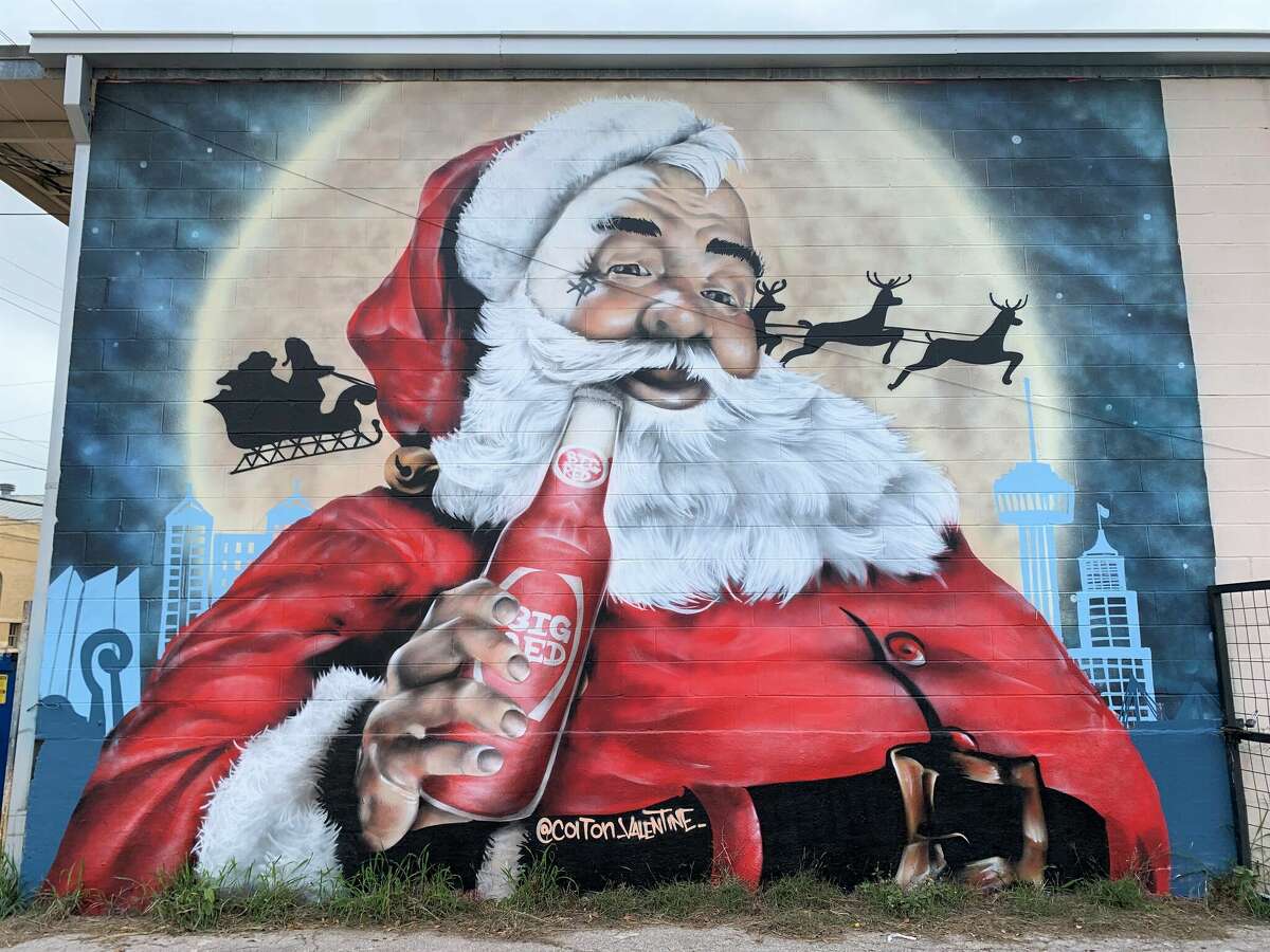 A mural of Santa Claus by San Antonio street artist Colton Valentine graces the side of Texas Custom Seating Inc. near the San Antonio Museum of Art.