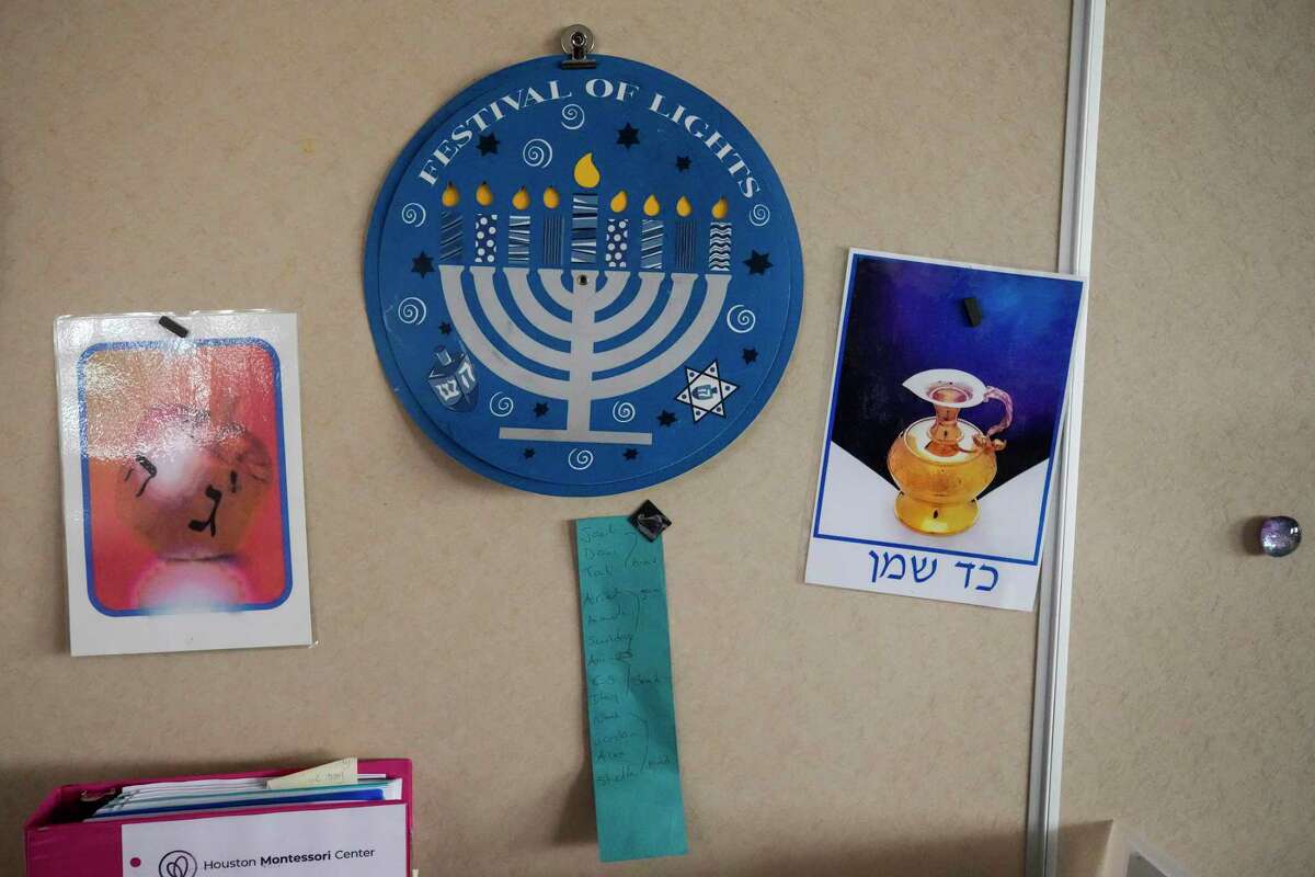 Hanukkah decorations adorn the walls in a classroom at Goldberg Montessori School on Thursday, Dec. 8, 2022 in Houston. Congregation Brith Shalom shares the campus with the school.