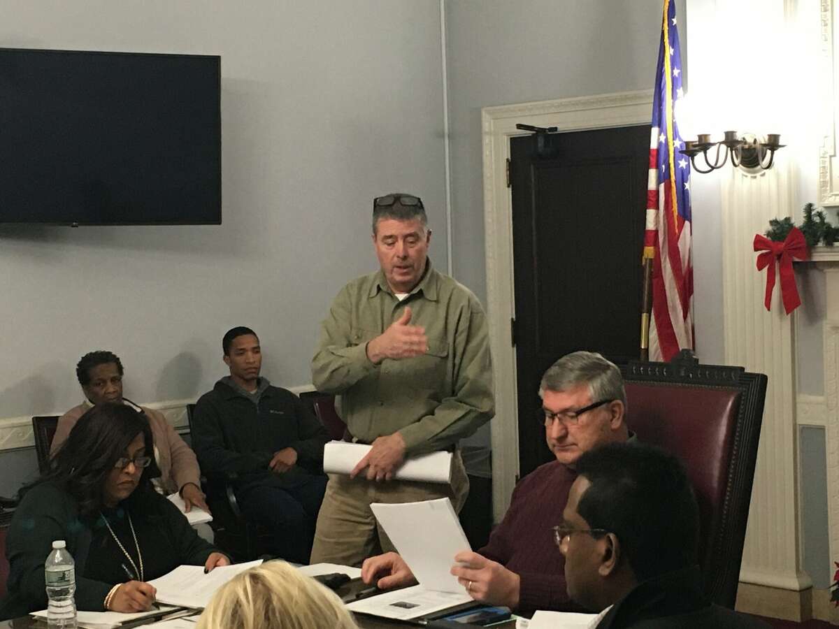 In this undated photograph, Schenectady General Services Commissioner Paul LaFond answers questions from City Council members during a committee meeting. A state ruling now requires a civil service test for the position.