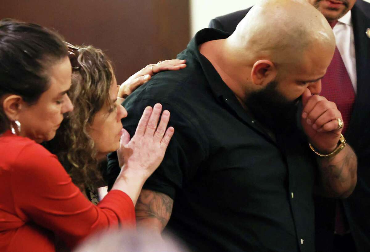 Joey Cantu is comforted during victim impact statements after former U.S. Border Patrol supervisor Juan David Ortiz was sentenced for capital murder Wednesday. Ortiz was convicted of killing four women in Laredo in September 2018 and will serve a life sentence without the possibility of parole. Cantu is the brother of Guiselda Alicia Cantu Hernandez, the third victim found killed by Ortiz.