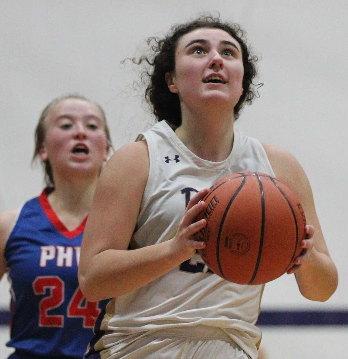Routt's Jaymee Vollmer drives to the basket during a girls' basketball game against Pleasant Hill-Western at the Routt Dome in Jacksonville Thursday night.