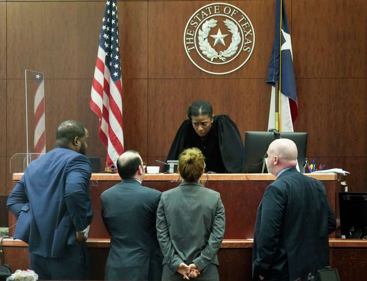 Judge Hazel B. Jones talks to the attorneys litigating in the murder trial against Lance Campbell on Friday, Dec. 9, 2022 in Houston. Campbell, 30, is standing trial in the 174th District Court on a murder charge in connection with the death of Michael Haynie, 60, a homeless man shot and killed in June 2019 outside a Hobby Airport-area washateria.