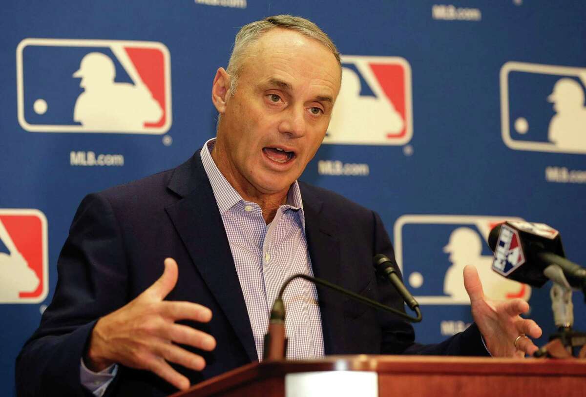 In this Feb. 3, 2017, file photo, Major League Baseball Commissioner Rob Manfred speaks during a news conference following a meeting with team owners in Palm Beach, Fla. Manfred says he can't offer a prediction on how likely it is that baseball will be altering the strike zone this season. Manfred discussed that and other potential rule changes Thursday, Feb. 16, 2017, at the Detroit Tigers' spring training complex, which was hosting a Grapefruit League media day.