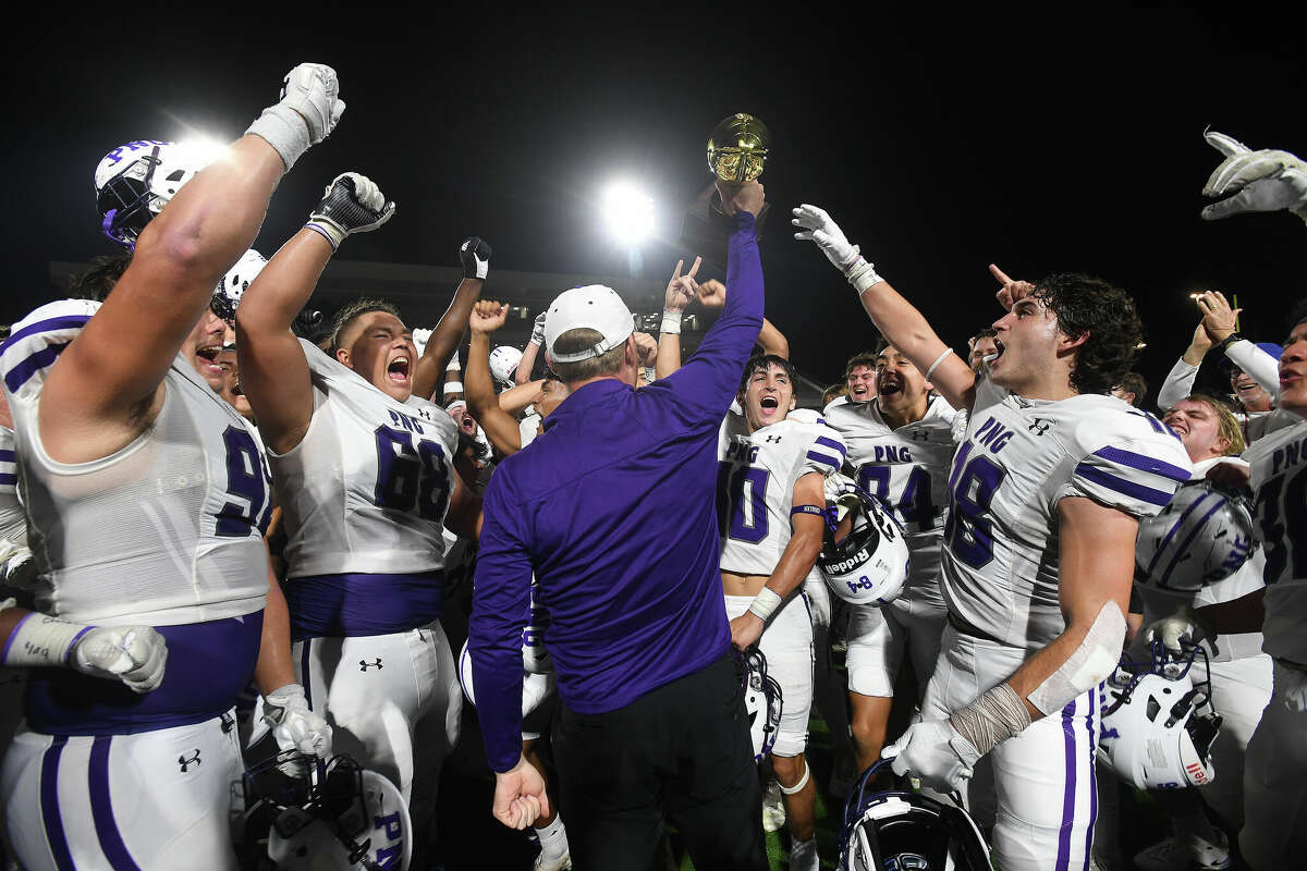Port Neches-Groves celebrates after defeating Liberty Hill for the state semi final win Friday at Katy Memorial Stadium. Photo made Friday, December 9, 2022 Kim Brent/Beaumont Enterprise