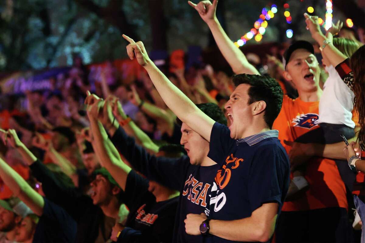 Fans cheer on their team as UTSA football celebrates their Conference USA championship title with a Rowdy River Rowdy Parade along the RiverWalk and the Arneson River Theater with supporters and fans on Friday, Dec. 9, 2022. The UTSA women’s soccer team was also honored for their conference championship win.