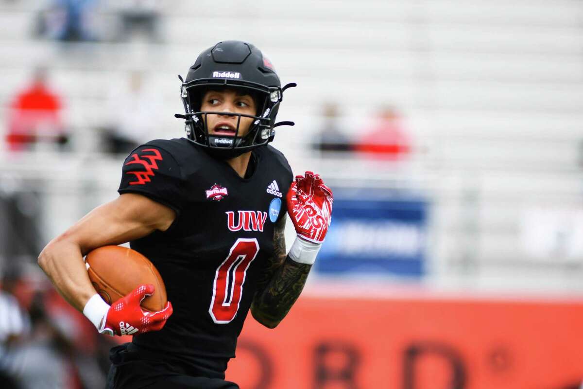 Incarnate Word wide receiver Darion Chafin (0) moves the ball down the field during the first quarter of Saturday’s NCAA playoff game against Furman at Tom Benson Stadium.