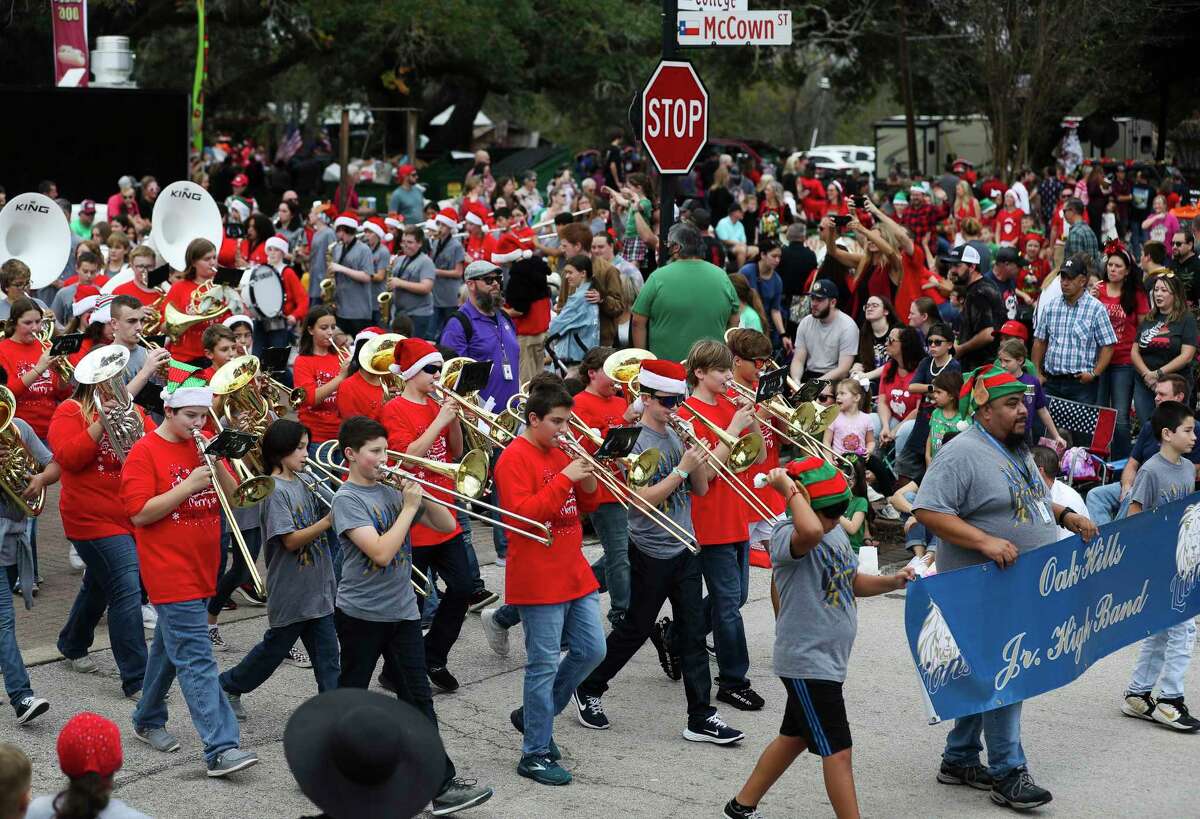 Members of the Oak Hills Junior High School band perform during the annual Montgomery Christmas Parade, Saturday, Dec. 10, 2022, in Montgomery.