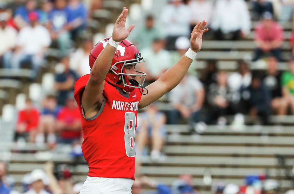 North Shore quarterback David Amador (8) reacts after a 1-yard touchdown by running back Rashaad Johnson in the second quarter of a high school Class 6A Division I state semifinal football game at Rice Stadium, Saturday, Dec. 10, 2022, in Houston.