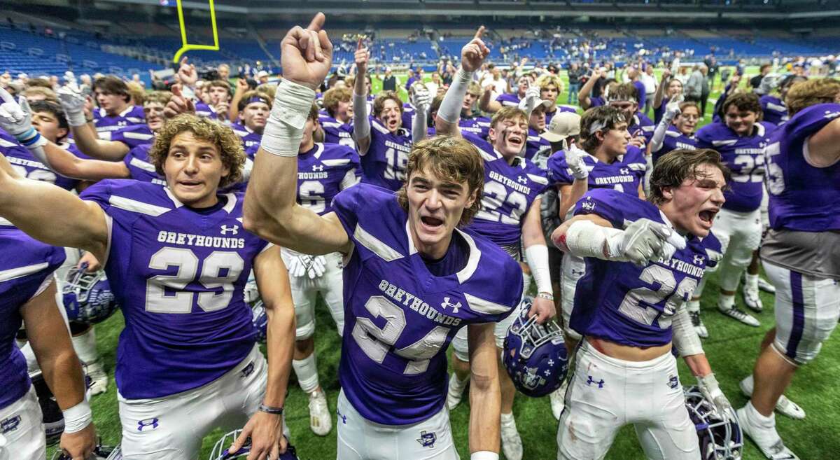 The Boerne Greyhounds celebrate Dec. 9, 2022, at the Alamodome after their Class 4A Division I semifinal win over the Tyler Chapel Hill Bulldogs to advance to the state championship.