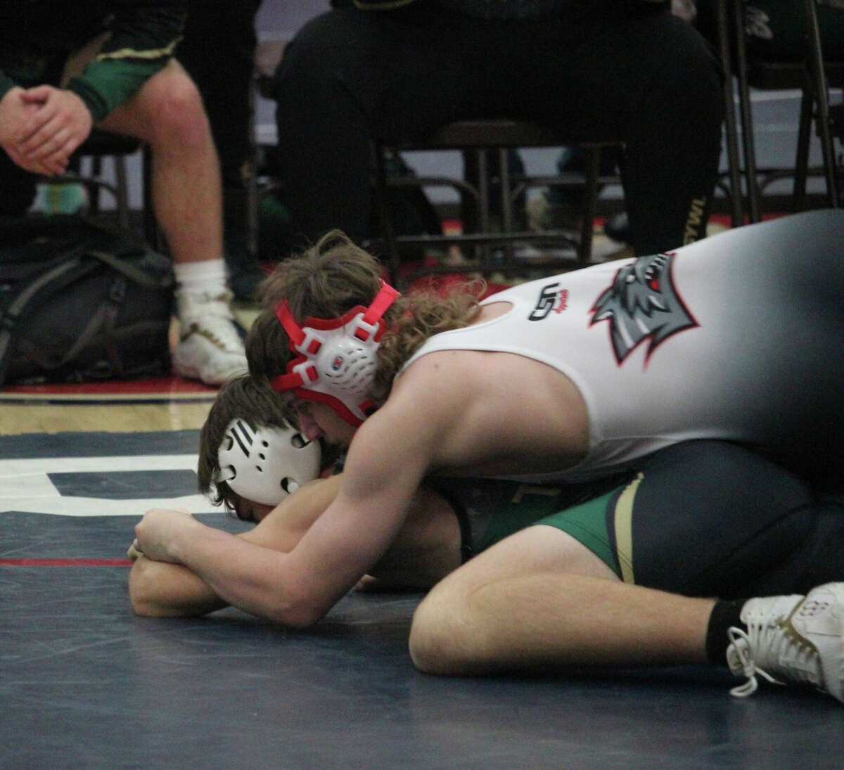 Reed City's Connor Ward (top) works on his opponent during Saturday's Big Rapids Invitational.