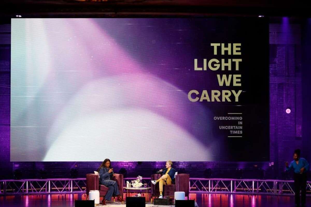 Former first lady Michelle Obama kicks off her tour for her new book “The Light We Carry: Overcoming in Uncertain Times” in Washington, DC, last month with Ellen DeGeneres at the Warner Theater.