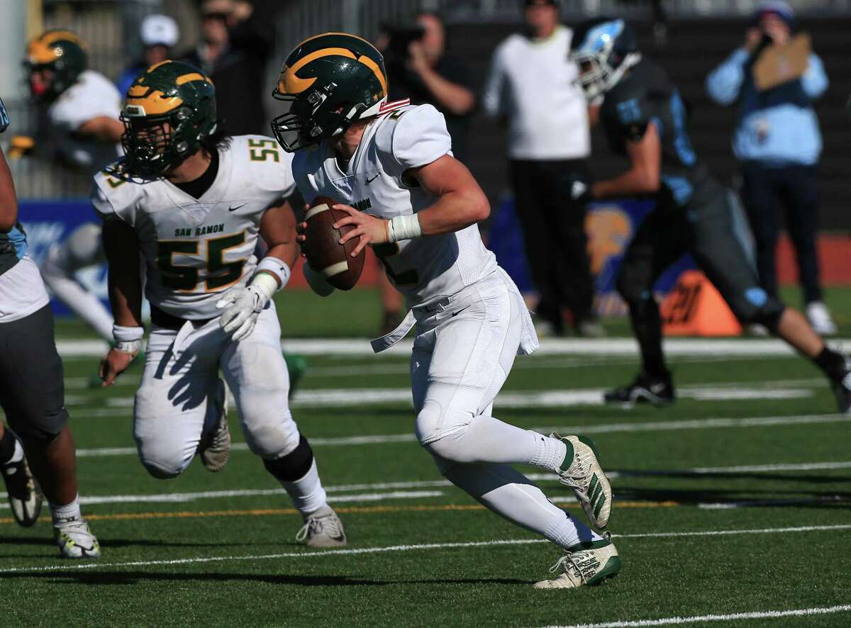 San Ramon Valley-Danville junior quarterback Luke Baker threw for 185 yards and two scores and rushed for 42 yards and another TD in his team's 31-24 OT loss to Granite Hills in the state 2-A title game.