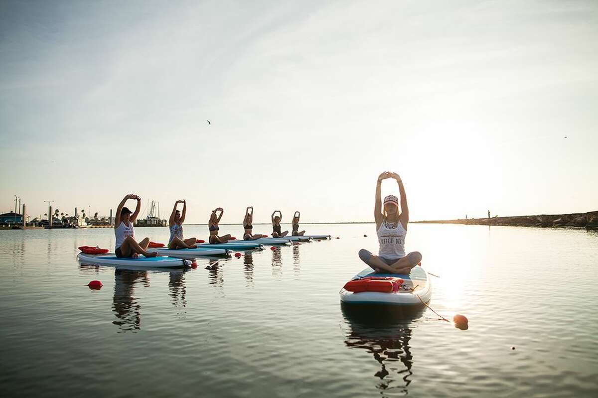 Water Dog Floating Yoga offers SUP yoga, Pilates, and fitness classes on the water.