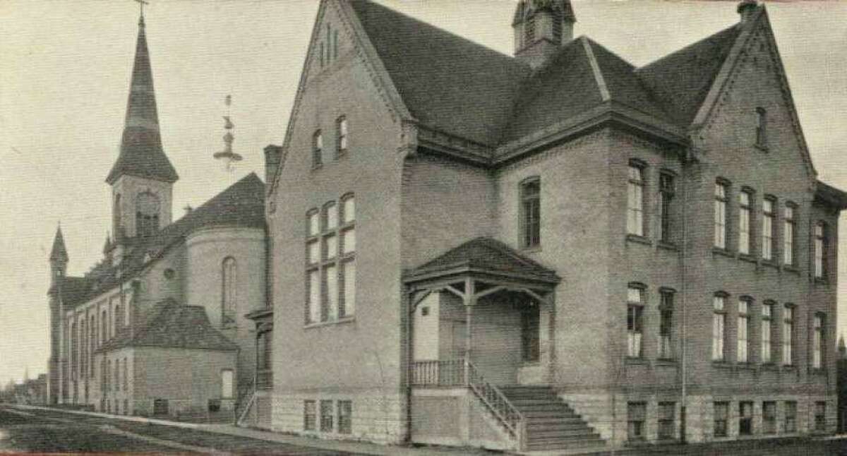 The Guardian Angels Church and School are shown in this early 1900 photograph.