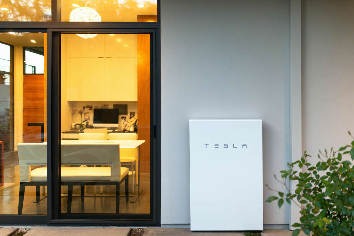 A Tesla Powerwall, installed in this home, stores energy to be used during an outage or high demand times when electric rates are higher. 