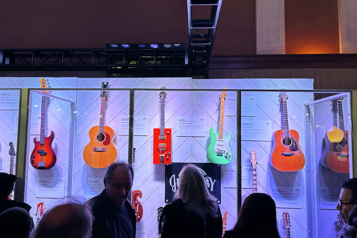 Guitars formerly owned by famous musicians on display as part of the Jim Irsay Collection at Bill Graham Civic Auditorium in San Francisco, on Dec. 10, 2022.