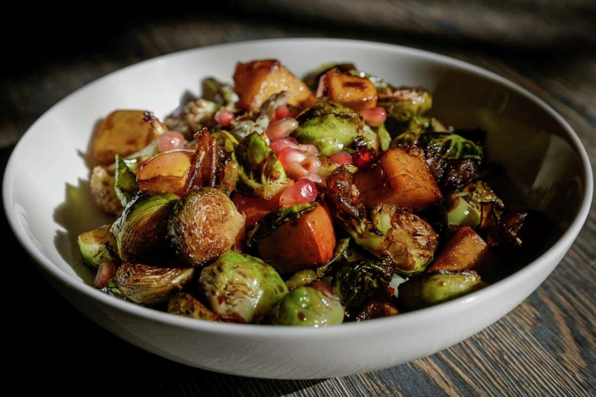 Roasted vegetable salad with Brussels sprouts, dates, apple and pomegranate at Calabash in Oakland.