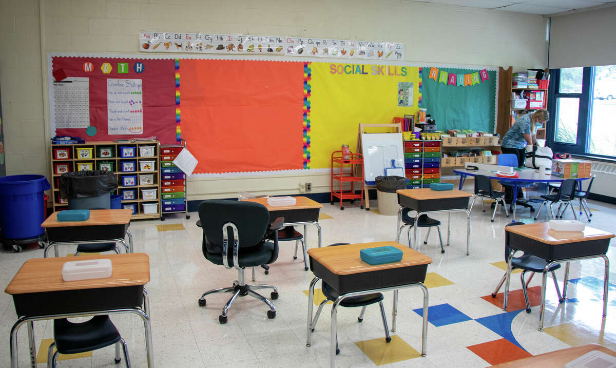 Sara Calechnan gets her classroom ready at Orange Avenue School in Milford before the start of the 2021-22 school year.