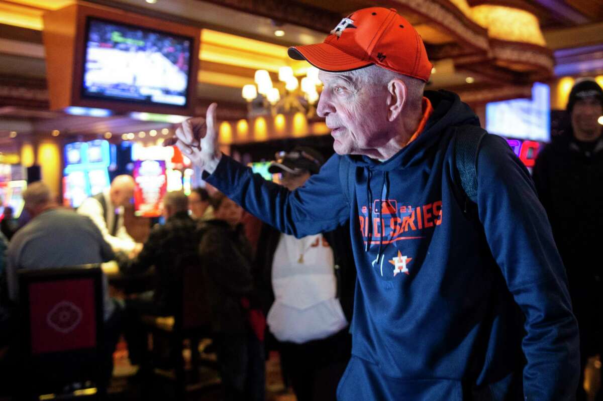 Jim McIngvale, better known as "Mattress Mack," walks through the Beau Rivage Casino in Biloxi, Miss., to make a $500,000 bet on the winner of the NCAA men's basketball tournament on Tuesday, Nov. 15, 2022. McIngvale, who won $75 million after betting on the Houston Astros in the 2022 World Series, bet that the Houston Cougars would win.