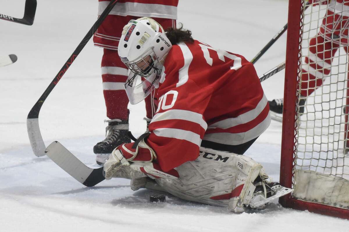 Greenwich goalie Emma Kunschner plays against New Canaan in the FCIAC girls hockey semifinals on Wednesday, February 23, 2022 at the Darien Ice House in Darien, Conn.