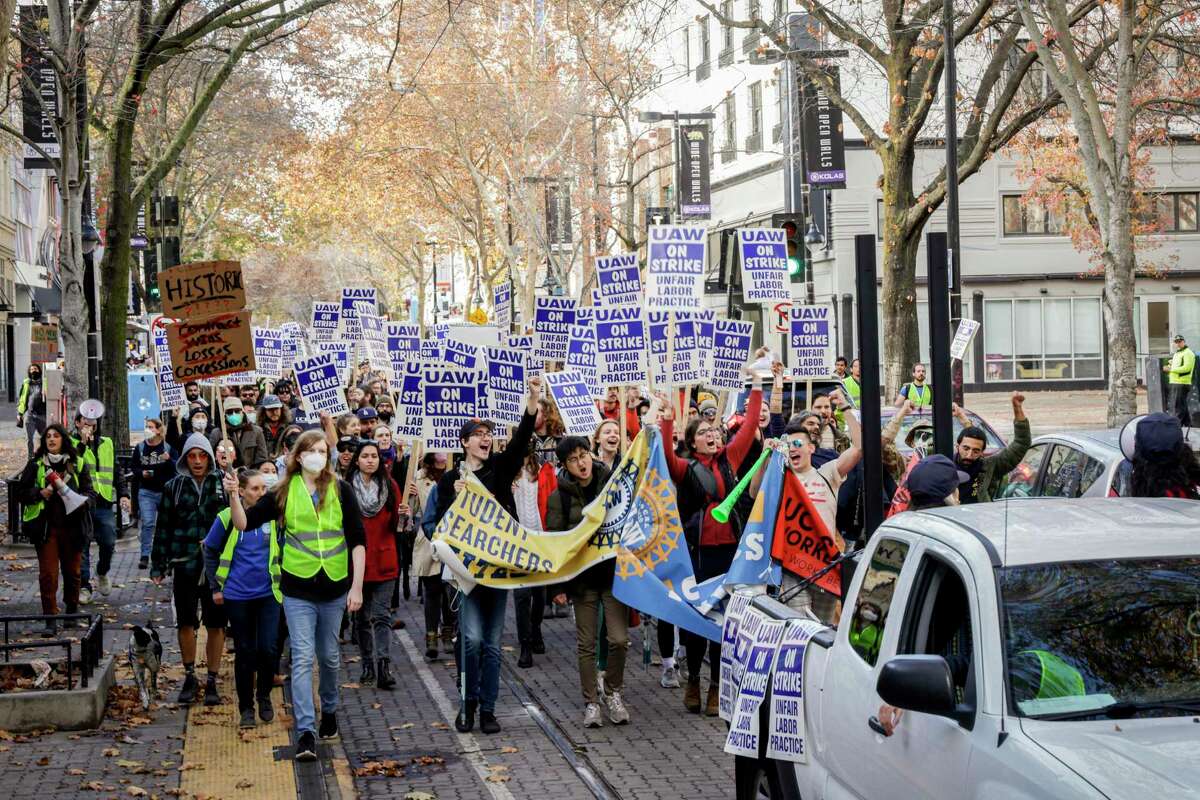 Striking University of California graduate workers and march in Sacramento early this month. Strike members want the state legislature to demand the UC system negotiate equitably and engage in fair bargaining practices.
