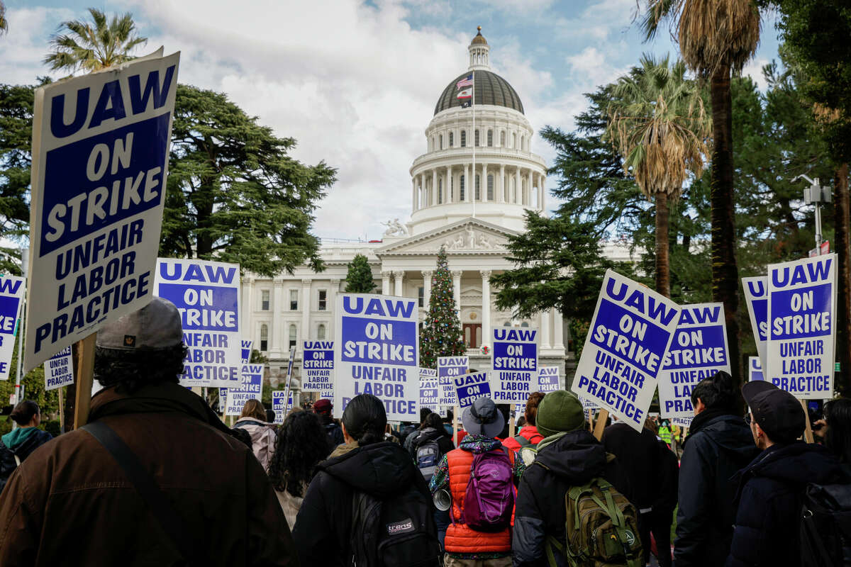 Striking UC graduate student workers march on the Capitol in Sacramento on Dec. 5.