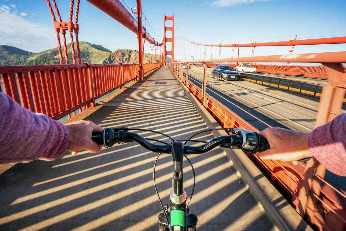 A bicyclist gets ready to cross the Golden Gate Bridge in San Francisco, Calif.