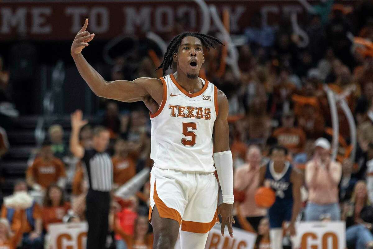 Texas guard Marcus Carr celebrates hitting a 3-pointer on his way to 28 points Monday night in an overtime victory over Rice.