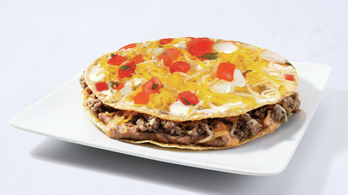 A promotional photo of Taco Cabana's Double Crunch Pizza. The San Antonio fast-food chain announced it will be available on Dec. 19, 2022.