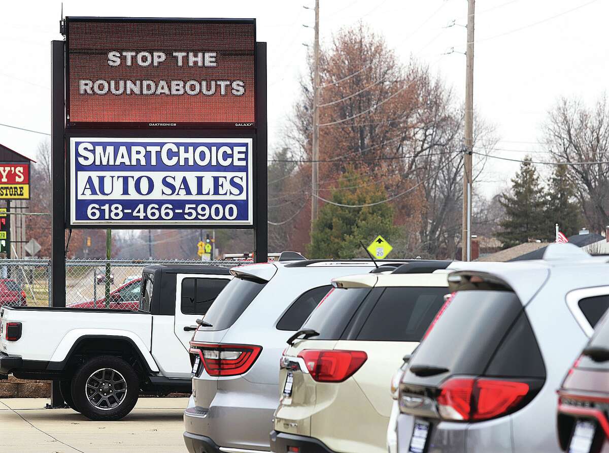 John Badman|The Telegraph SmartChoice Auto Sales on Delmar Avenue in Godfrey is expressing its dislike Monday of a plan to put in roundabouts on Illinois 3 at West Delmar Avenue. The proposed construction would cut off residents and businesses to the west of the construction site and cause a 9.7-mile detour for several months.