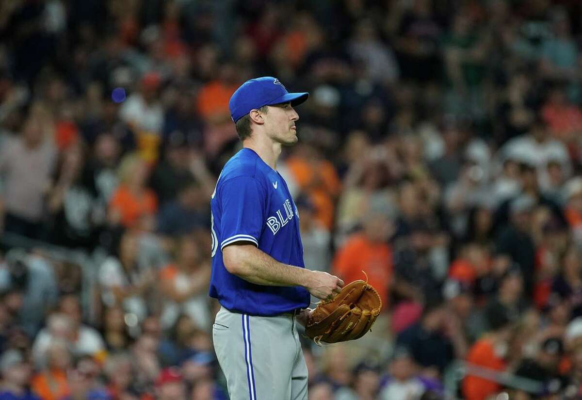 Toronto Blue Jays starting pitcher Ross Stripling (48) after allowing a run against the Houston Astros during the third inning of an MLB game at Minute Maid Park on Friday, April 22, 2022, in Houston.