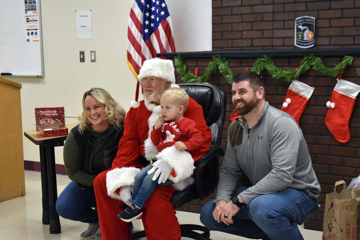 The Department of Public Safety hosted a donation drive for the Eagle Village organization and offered photos with Santa for those donating. 