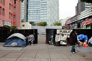 Stalled S.F. housing sites are creating eyesores with tents, dumping and drug use. The ‘mess’ could last years
