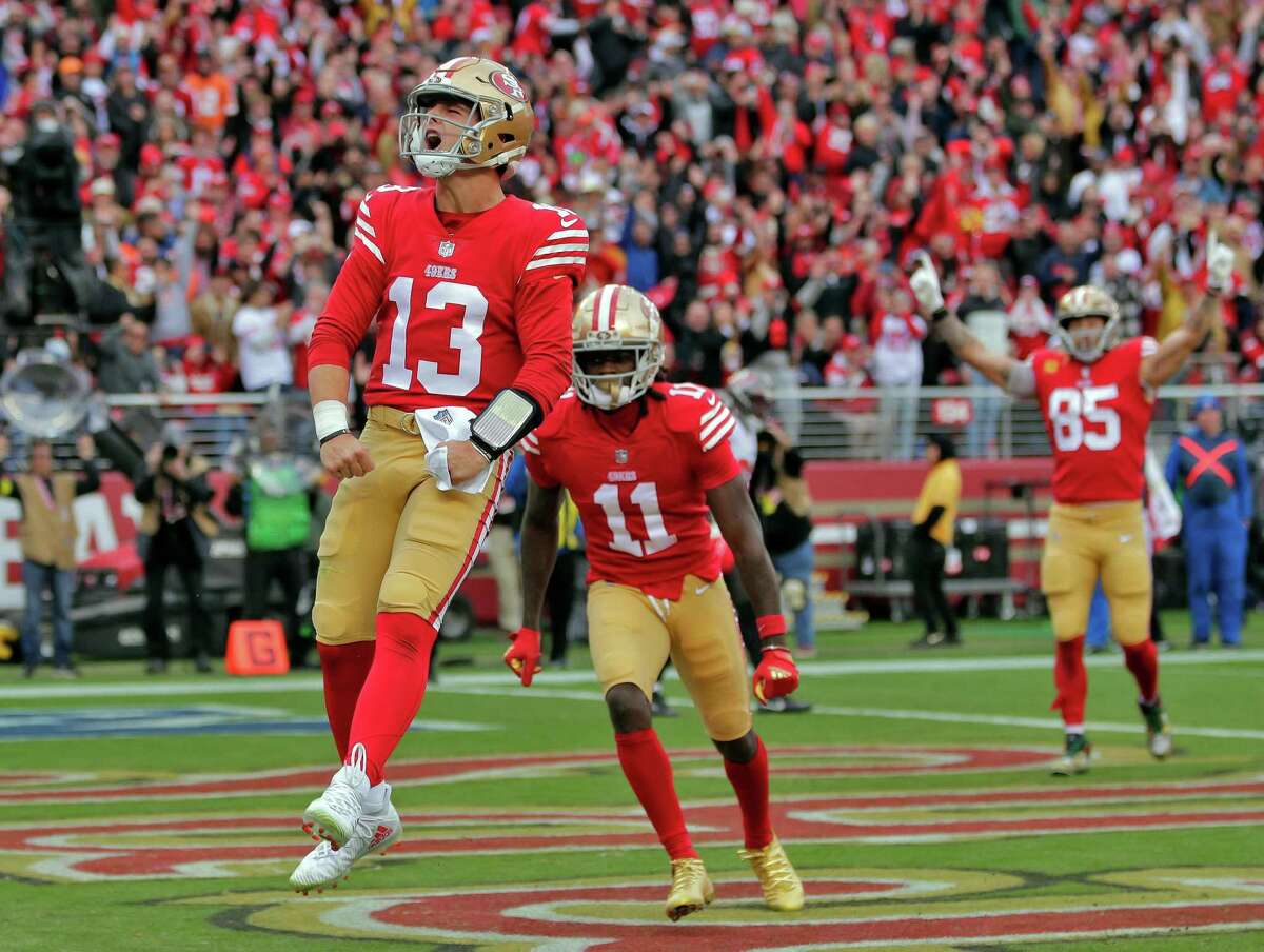 Brock Purdy (13) celebrates after scampering in for a touchdown in the first half as the San Francisco 49ers played the Tampa Bay Buccaneers at Levi’s Stadium in Santa Clara, Calif., on Sunday, December 11, 2022.
