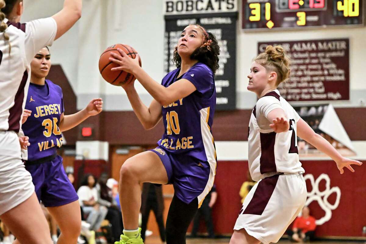Jersey Village Falcons guard Jayla Lewis (10) drives to the basket against the Cy Fair Bobcats during the second half of a District 17-6A game in Cypress, Tuesday, Dec. 13, 2022.